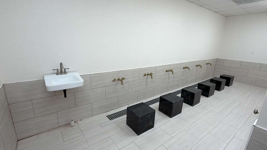 Wudhu facilities being fitted at Masjid-e-Aaminah